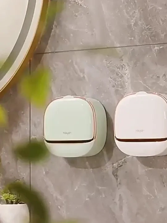 Wall-mount soap dish in mint and white colors on bathroom wall